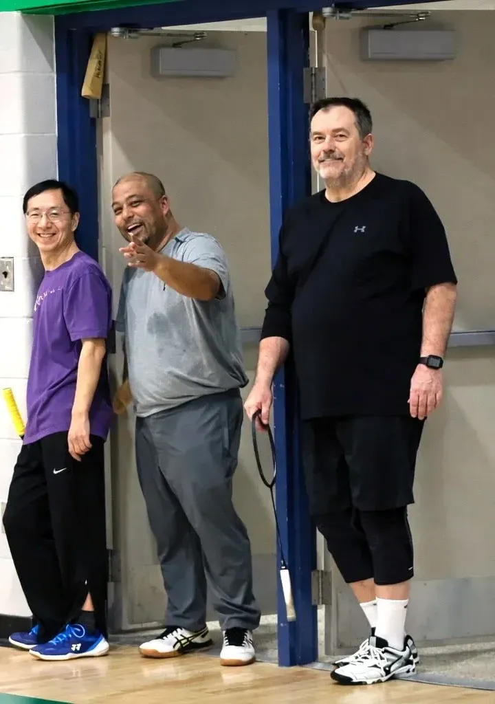 smiling-members-watching-games